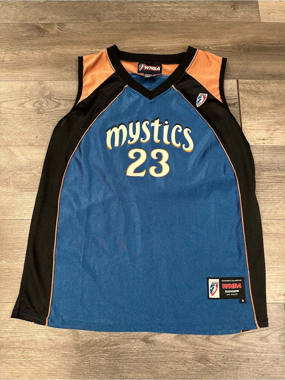 NBA Mystics Blue and Black women’s Jersey with Orange Accents #23